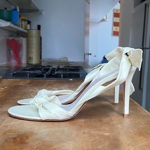 BCBG off-white strappy heels.